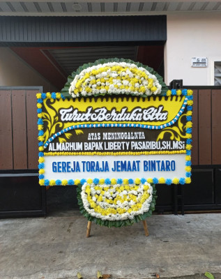 Papan Bunga Duka di Wangbe